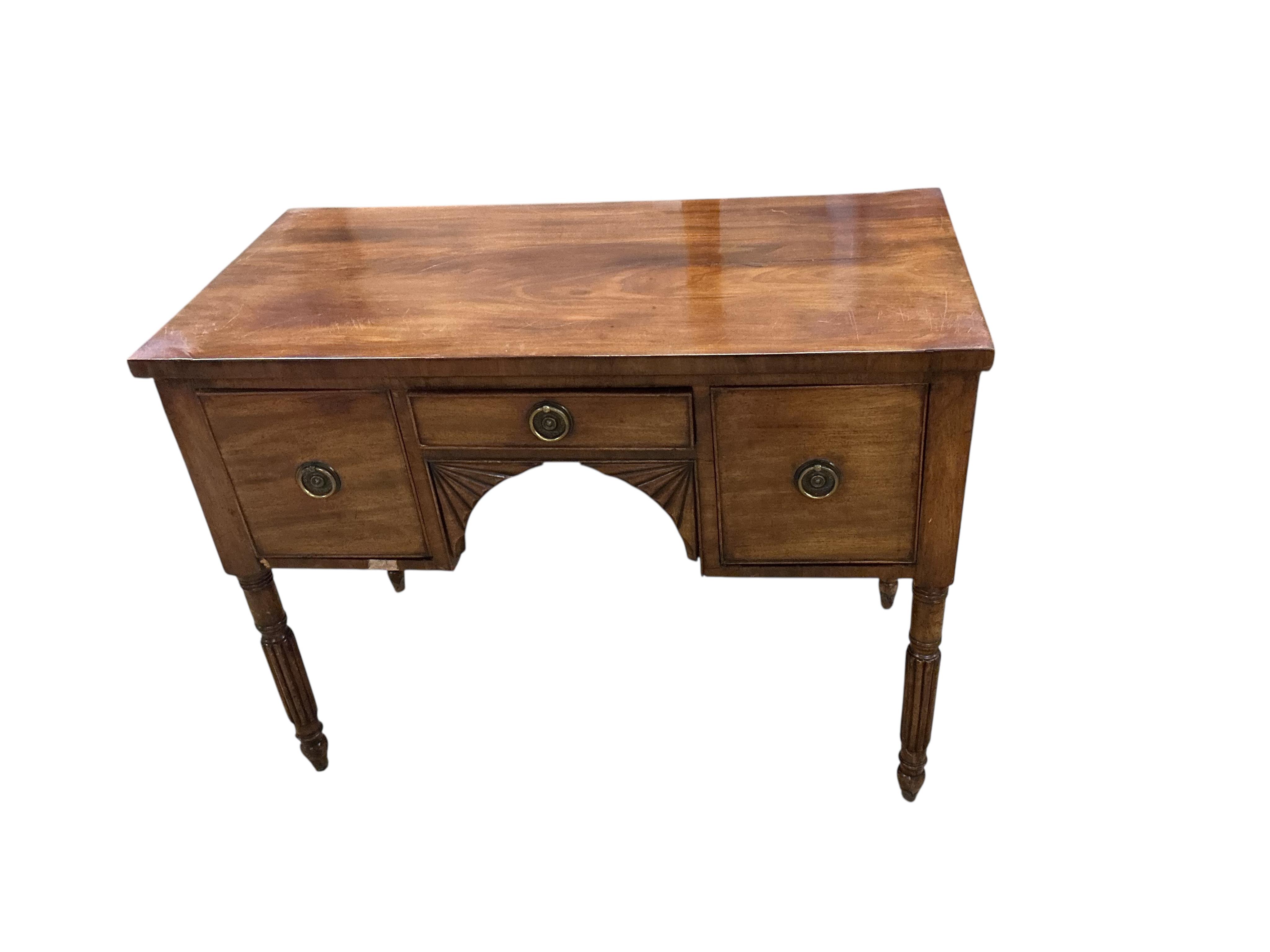 A Regency mahogany kneehole dressing table, width 94cm, depth 47cm, height 72cm